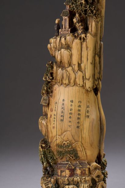 null Group in carved polychrome ivory, representing a mountain decorated with pavilions...
