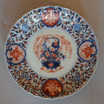 null * Soup plate in porcelain decorated in blue underglaze, red and gold known as...