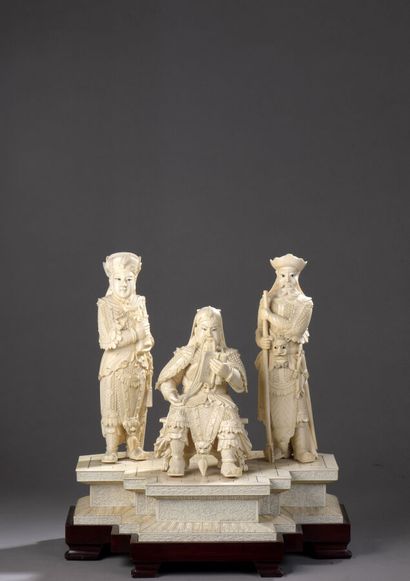 null Group in carved ivory and ivory veneer showing a general in armor flanked by...