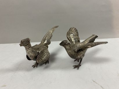 null Pair of pheasant hens, in silver 1st title 925‰.
Misses and accidents.
Gross...