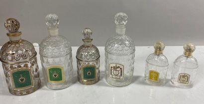 GUERLAIN
6 glass bottles of which two with...