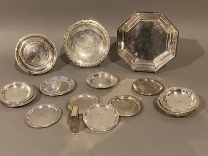 A set of golf trophies: thirteen small cups,...