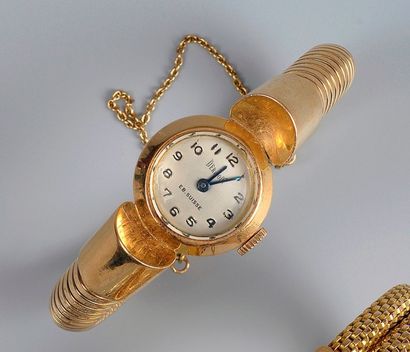 null MONTRE-BRACELET de dame en or jaune, la montre de forme ronde, le tour de poignet...