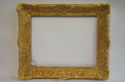 null Cadre en bois et stuc doré de style Bérain XXème siècle 34,6 x 44,6 cm - Profil:...