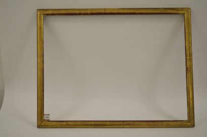 null Jonc en bois mouluré et doré. Circa 1940. 59,3 x 79,5 cm - Profil: 4 cm (25...