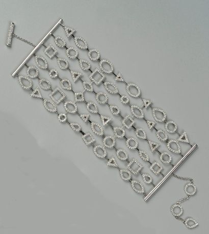 null Large bracelet articulé en or gris, retenant six lignes de motifs géométriques...