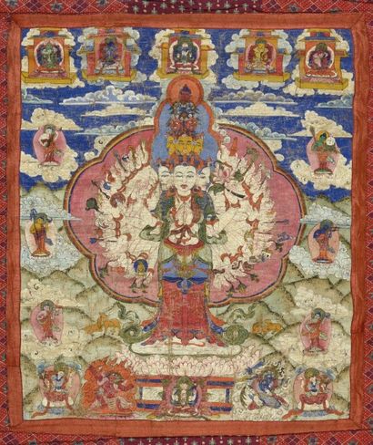 null THANGKA représentant le bodhisattva à onze têtes et cents bras entouré de seize...