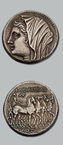 null - Seize litrae (274-216 av. J.-C.). 13,58 g. Règne de Hiéron II. Tête voilée...