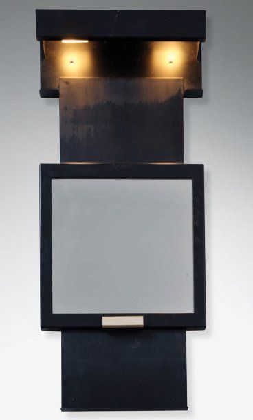 Pierre CHAREAU (1883-1950) Miroir, vers 1928.Miroir carré encadré demétal en S accroché...