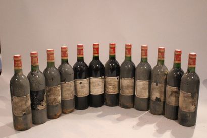 null 12 bouteilles LE TANA DE MALESCASSE 1985 Haut Médoc (BG, étiq très tachées)