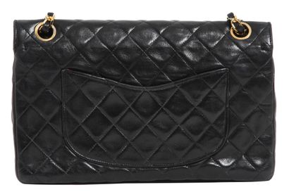 CHANEL Chanel quilted navy lambskin leather flag bag, 1986-88,

A Chanel quilted...