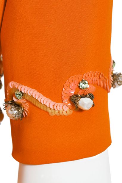 CARVEN A Carven couture orange silk-crepe evening gown, circa 1965,

A Carven couture...