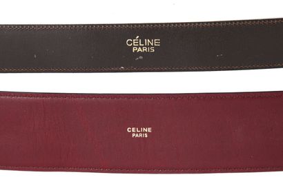 CELINE Une ceinture en cuir rouge Celine avec des médailles dorés, années 1990,

A...