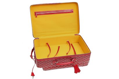 GOYARD A Goyard soft sided wheeled suitcase in red Goyardine leather, 1991,

A Goyard...