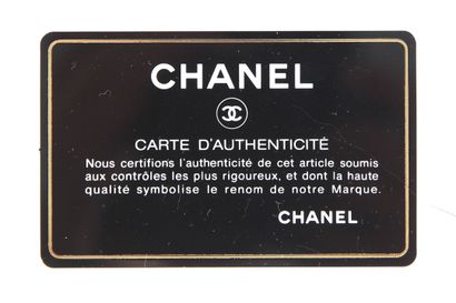 CHANEL Un sac à rabat en jersey matelassé violet aubergine de Chanel, 2014-15,

A...