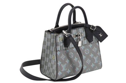LOUIS VUITTON A Louis Vuitton monogrammed leather mini steamer bag, modern,

A Louis...