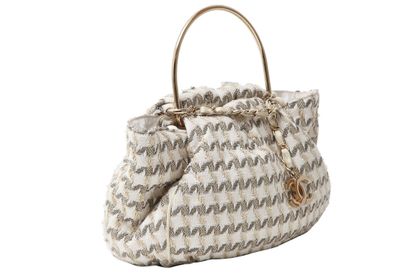 CHANEL A Chanel ivory and golden tweed handbag, 2004-2005,

A Chanel ivory and golden...