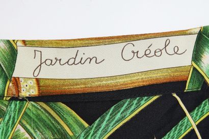 HERMES An Hermès silk blouse in 'Jardin Creole' print by Valerie Dawlat-Dumoulin,...