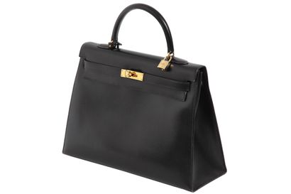 HERMES Un sac Kelly 35 en box noir, Hermès, 1995,

An Hermès black box calf leather...