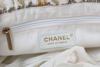 CHANEL A Chanel ivory and golden tweed handbag, 2004-2005,

A Chanel ivory and golden...