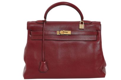 HERMES An Hermès Rouge Swift leather Kelly 35 bag, 1997,

An Hermes Rouge Swift leather...