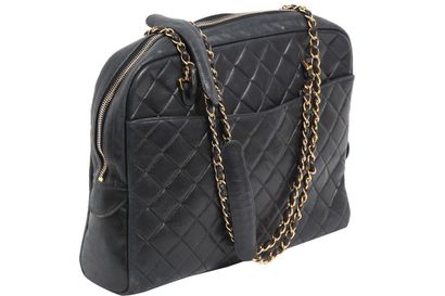 CHANEL A Chanel quilted navy lambskin leather shoulder bag, 1996-97

A Chanel quilted...