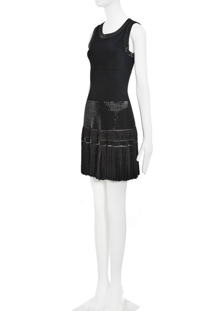 ALAÏA A black beaded knitted silk-viscose blend dress by Azzedine Alaïa, circa 2010.

An...
