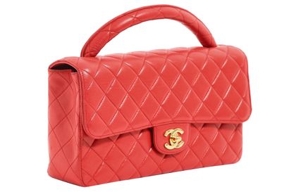 CHANEL A Chanel red quilted lambskin leather bag, 1991-94

A Chanel red quilted lambskin...