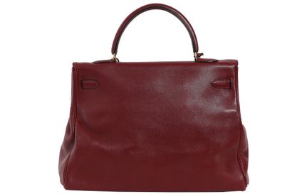 HERMES An Hermès Rouge Swift leather Kelly 35 bag, 1997,

An Hermes Rouge Swift leather...