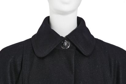 CHANEL A Chanel coat, 2000s,

A Chanel coat, 2000s,

labeled, size 38, black wool...