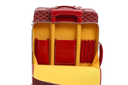 GOYARD Une valise souple à roulettes Goyard en cuir Goyardine rouge, 1991,

A Goyard...