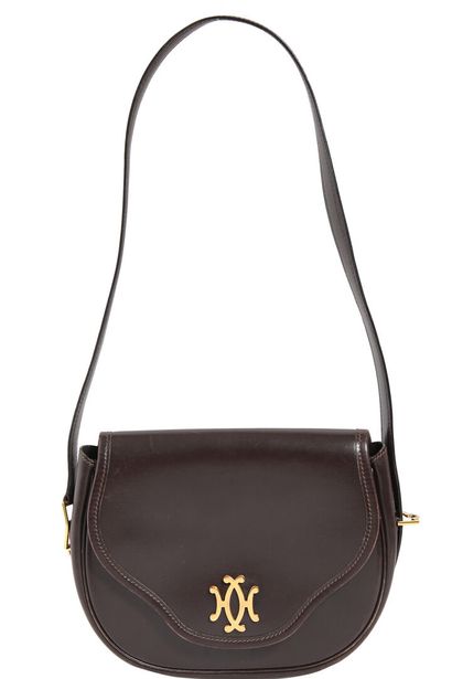 HERMES An Hermès brown leather handbag, late 1960s,

An Hermès brown leather handbag,...