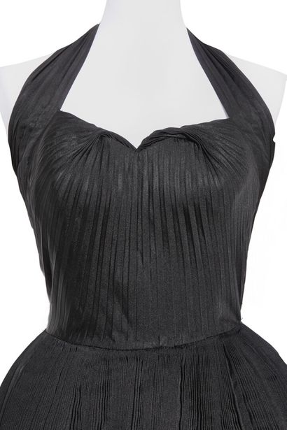 Nina RICCI A Nina Ricci black silk faille dress, 1948-49

A Nina Ricci black silk...