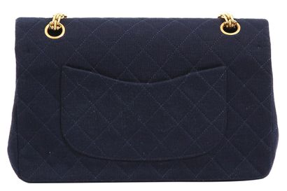 CHANEL A Chanel quilted navy jersey re-issue flap bag, 1989-91,

A Chanel quilted...