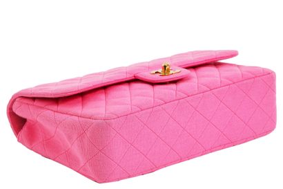 CHANEL A Chanel bubblegum-pink quilted jersey flap bag, probably early 1990s, with...