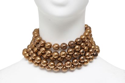 CHANEL 
A Chanel pearl beaded demi-parure, 1984,





A Chanel bronze 'pearl' beaded...