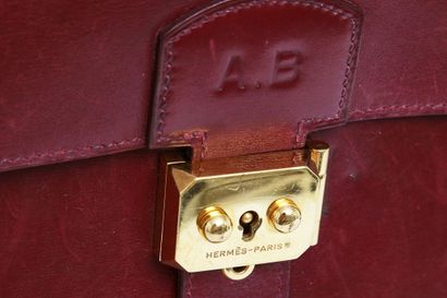 HERMES An Hermes oxblood leather briefcase, circa 1970,

An Hermès oxblood leather...