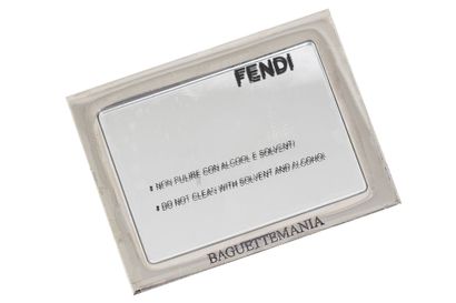 FENDI A Fendi sequinned Baguette bag, modern

A Fendi sequinned Baguette bag, modern,

stamped,...