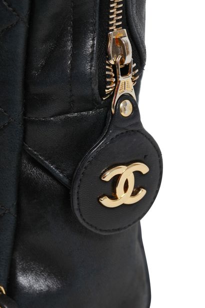 CHANEL A Chanel quilted navy lambskin leather shoulder bag, 1996-97

A Chanel quilted...