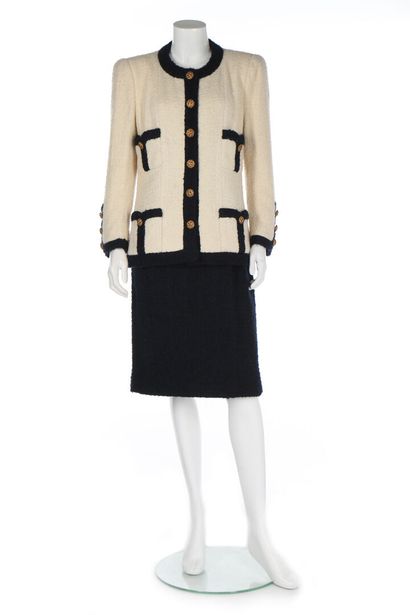 CHANEL A Chanel couture ivory and navy tweed suit, Autumn-Winter, 1984-85,

A Chanel...