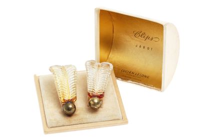 Lucien Lelong Rare Lucien Lelong glass perfume bottle/dress-clips, 1940s

Rare Lucien...