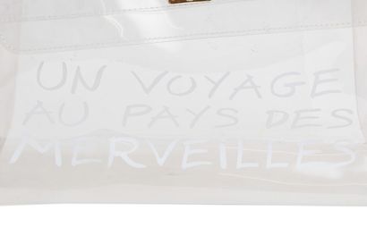 HERMES An Hermès transparent vinyl souvenir bag from the Kelly bag exhibition, 1997,

An...
