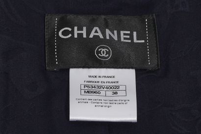 CHANEL A Chanel tweed and leather ensemble, circa 2005,

A Chanel tweed and leather...