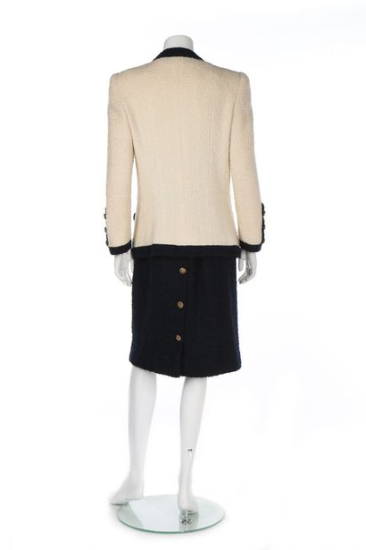 CHANEL A Chanel couture ivory and navy tweed suit, Autumn-Winter, 1984-85,

A Chanel...
