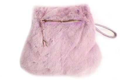 null A lavender swing-style mink coat, probably 1990s,

A lavender swing-style mink...