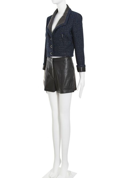 CHANEL A Chanel tweed and leather ensemble, circa 2005,

A Chanel tweed and leather...
