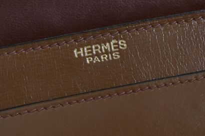 HERMES A Hermes tan leather bag from the 1960s,

An Hermès tan leather bag 1960s,

stamped,...