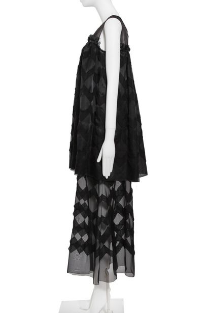 CHANEL 
A Chanel black organza evening gown, modern.





A Chanel tiered black organza...