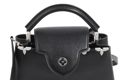 LOUIS VUITTON A Louis Vuitton Capucine bag in black leather, modern,

A Louis Vuitton...