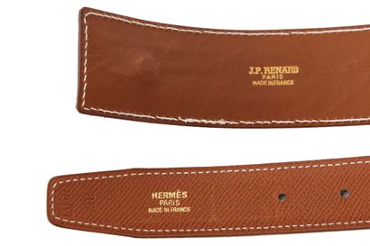 HERMES Une ceinture réversible Hermès en cuir avec boucle lézard doré, 1997,

An...